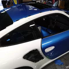  Porsche 911, undergoing a vinyl color wrap process. 